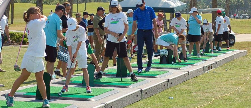 Children with special needs learn to golf at Tesori Family Foundation golf clinic